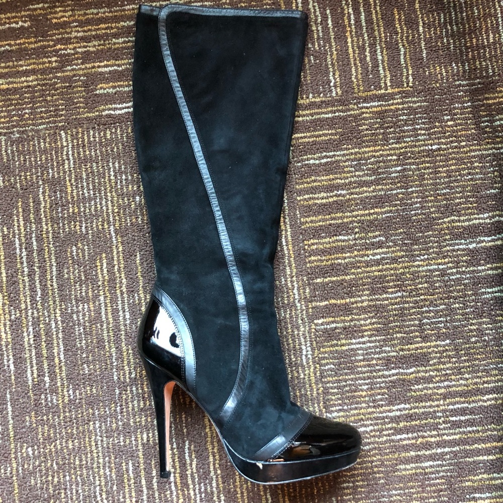 Womens knee high black boots with leather accents. Size9, Worn once